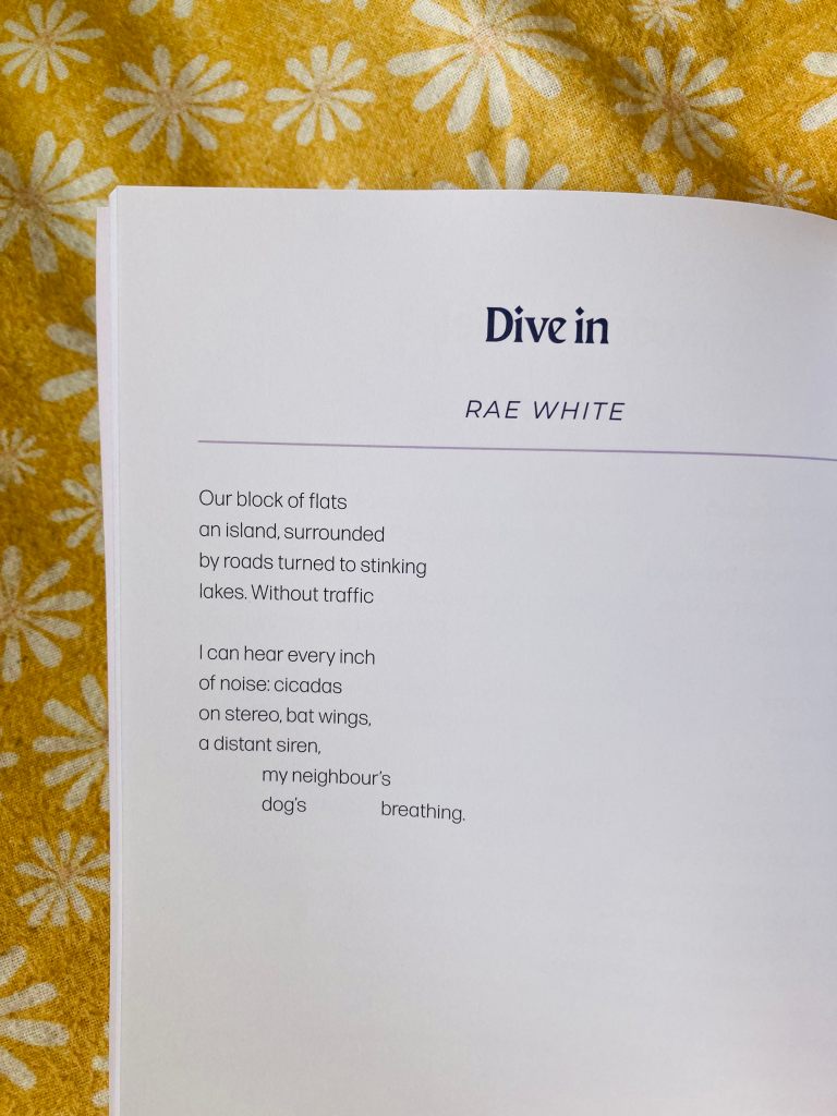 A white page sits on top of a yellow and white floral background. Text on the page reads, ‘Dive in. Rae White. Our block of flats an island, surrounded by roads turned to stinking lakes. Without traffic can hear every inch of noise: cicadas on stereo, bat wings, a distant siren, my neighbour's dog's breathing.’
